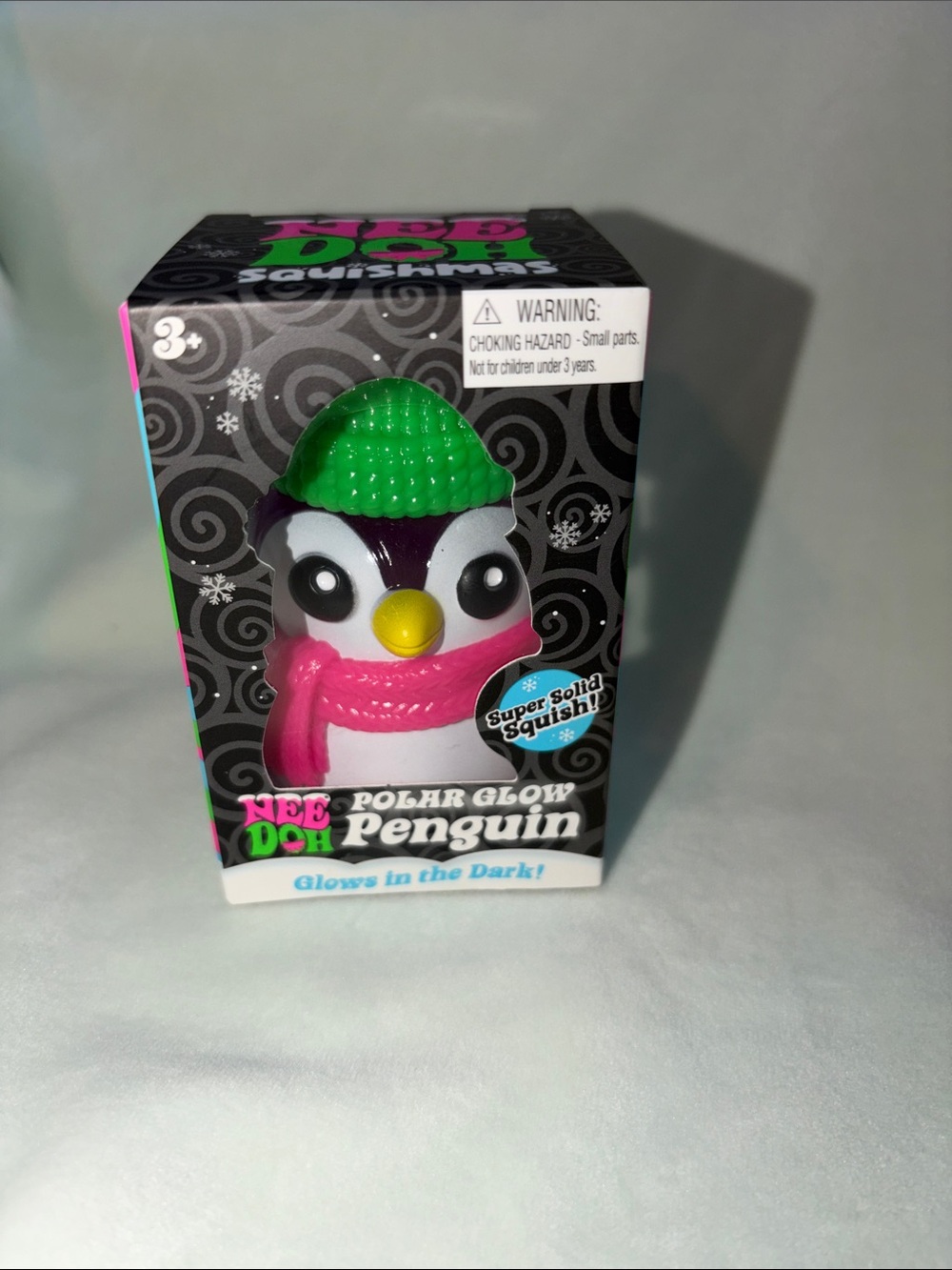 NeeDoh Polar Glow Penguin- rare green hat and pink scarf